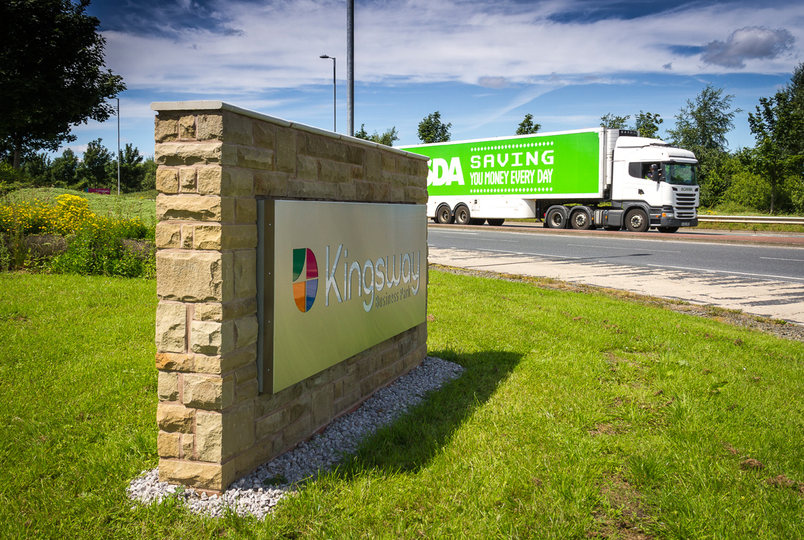 The Kingsawy Business Park sign shown in daylight